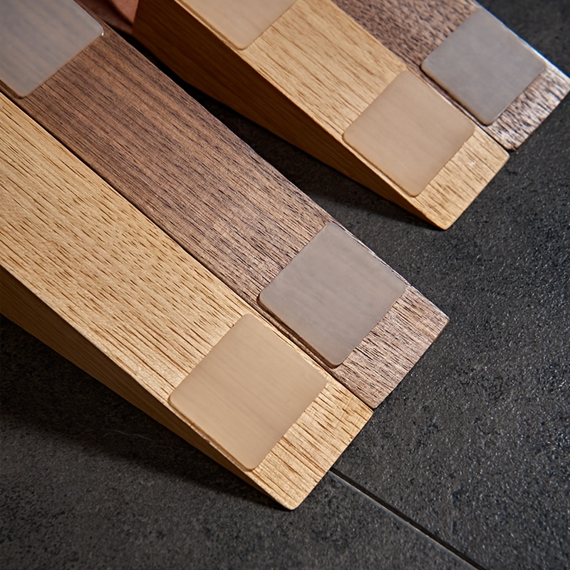 無垢材のドアストッパー、装飾的なウェッジ型、革製ストラップ付 - Door Stopper Heavy のレビューと価格